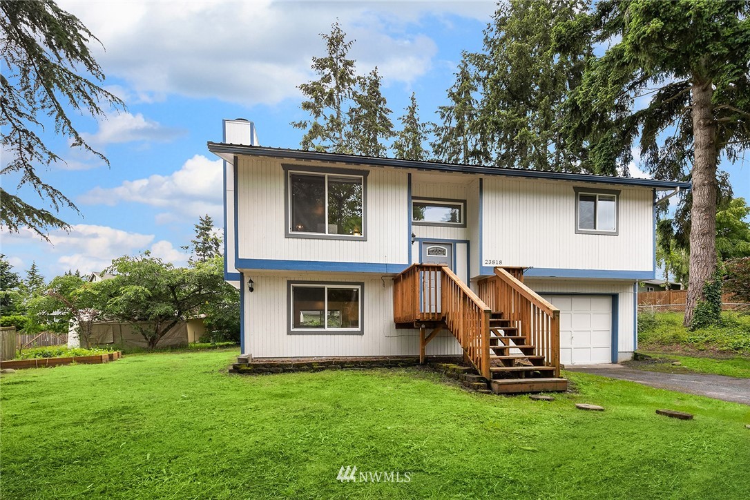 23818 1st Avenue West Bothell, WA 98021 - Photo 1 of 20 a house view with a garden space