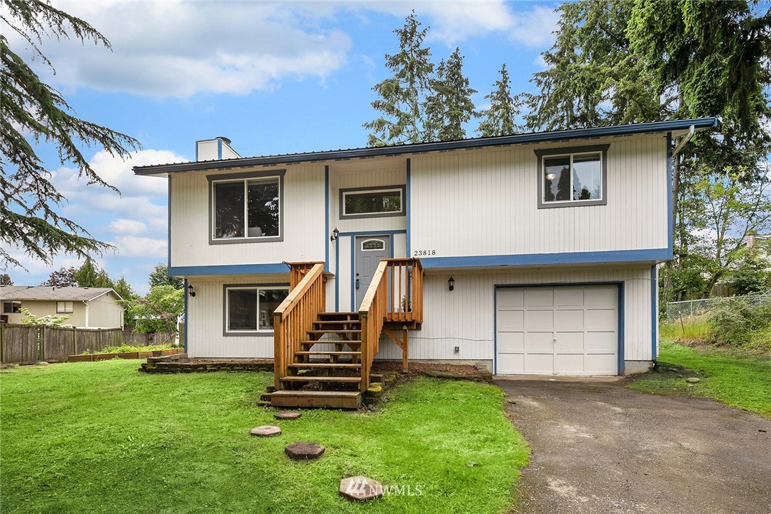 23818 1st Avenue West Bothell, WA 98021 - Photo 19 of 20 a front view of a house with garden
