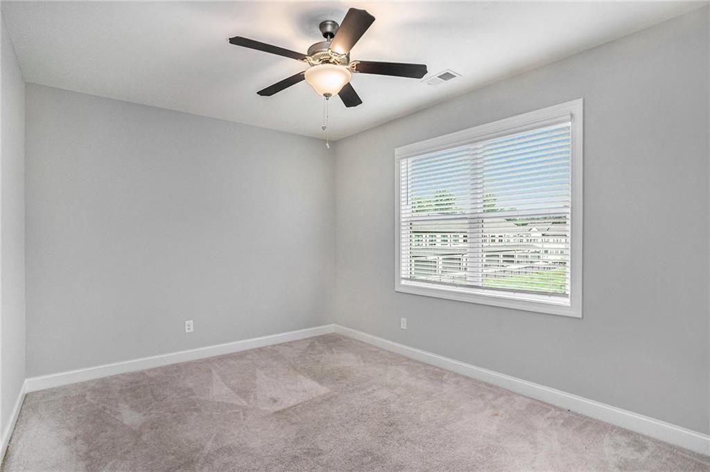 1341 Parc Bench Road Atlanta, GA 30316 - Photo 13 of 28 a view of an empty room with a window