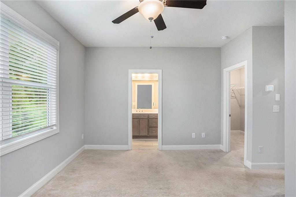 1341 Parc Bench Road Atlanta, GA 30316 - Photo 14 of 28 a view of a livingroom with a ceiling fan and window