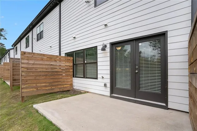 a view of a house with a yard and garage