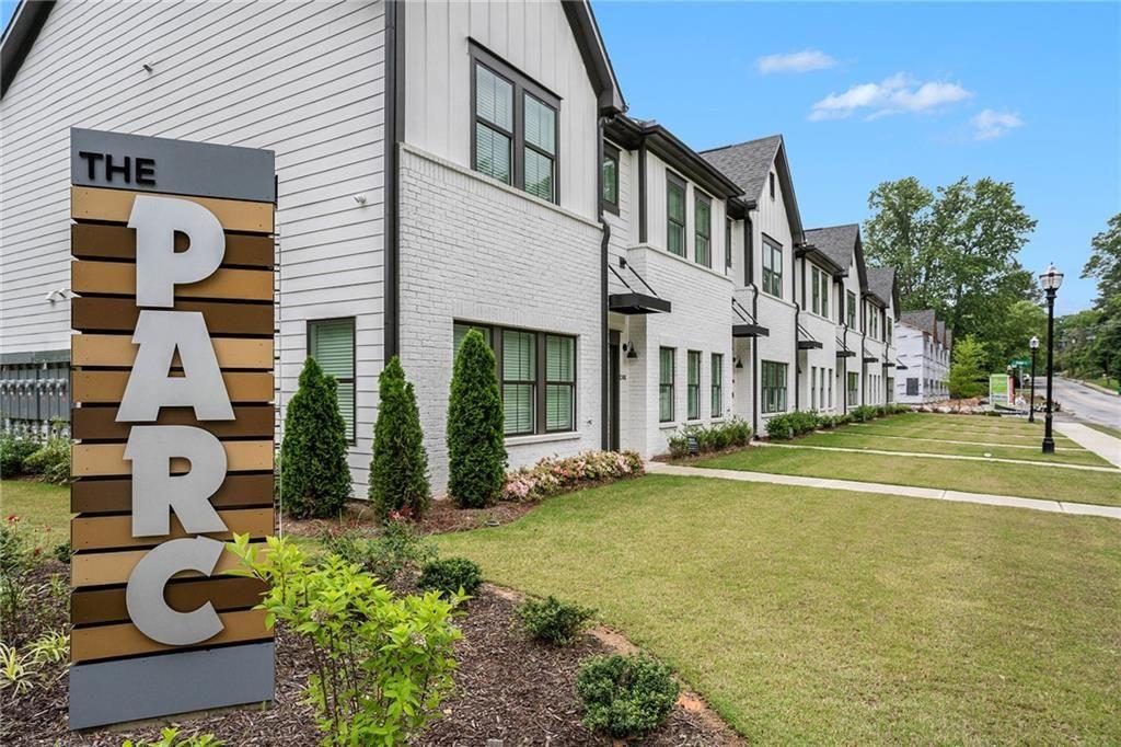 1341 Parc Bench Road Atlanta, GA 30316 - Photo 26 of 28 a view of a white house with a large windows