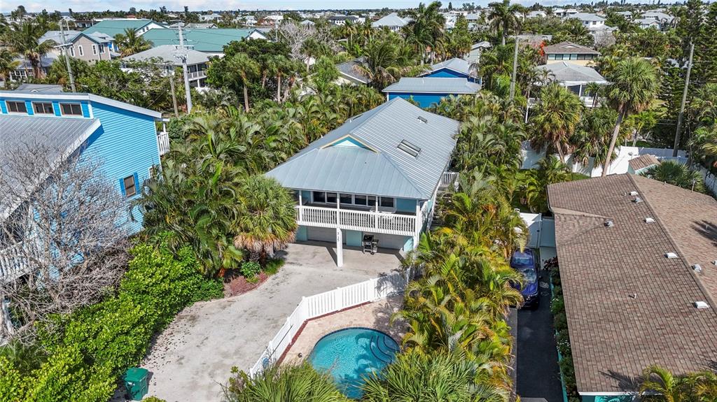 315 Spring Avenue Anna Maria, FL 34216 - Photo 49 of 63 an aerial view of multiple house