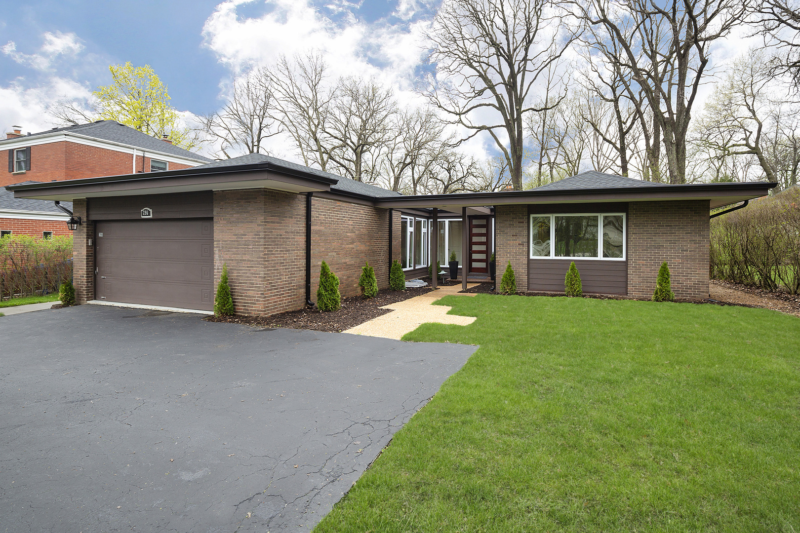 296 Ridge Road Highland Park, IL 60035 - Photo 1 of 20 a front view of house with yard and green space