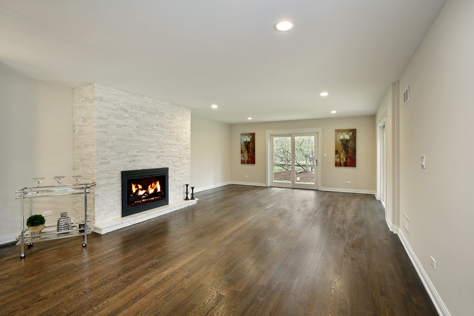 296 Ridge Road Highland Park, IL 60035 - Photo 4 of 20 an empty room with a fireplace and window