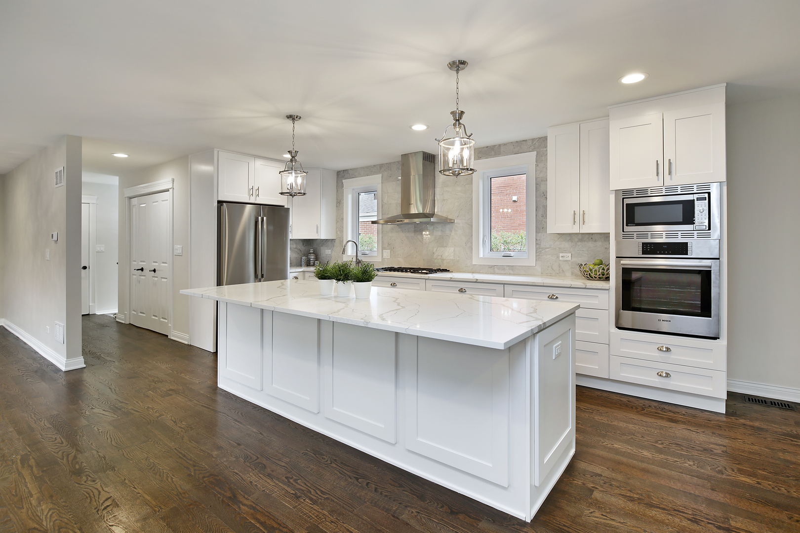 296 Ridge Road Highland Park, IL 60035 - Photo 5 of 20 a kitchen with kitchen island a sink stainless steel appliances and cabinets