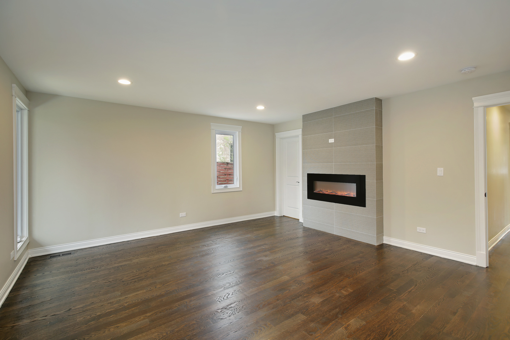 296 Ridge Road Highland Park, IL 60035 - Photo 9 of 20 a view of an empty room with wooden floor and a window