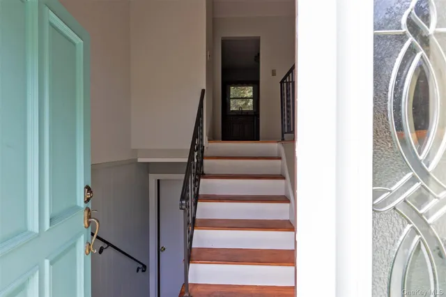 a view of an entryway with staircase