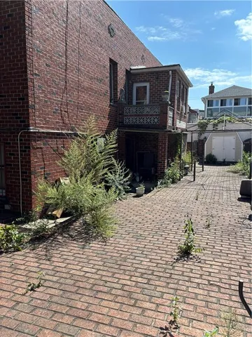 a building with trees in front of it