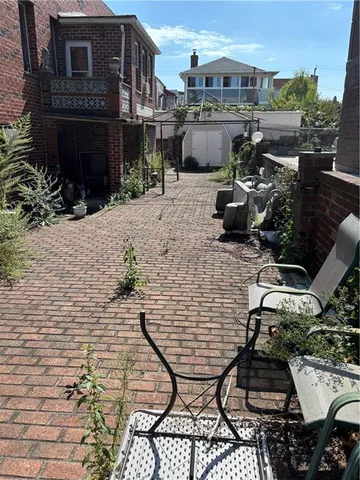 a view of a chairs and tables in the patio