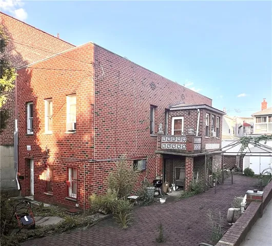 a front view of a house with yard