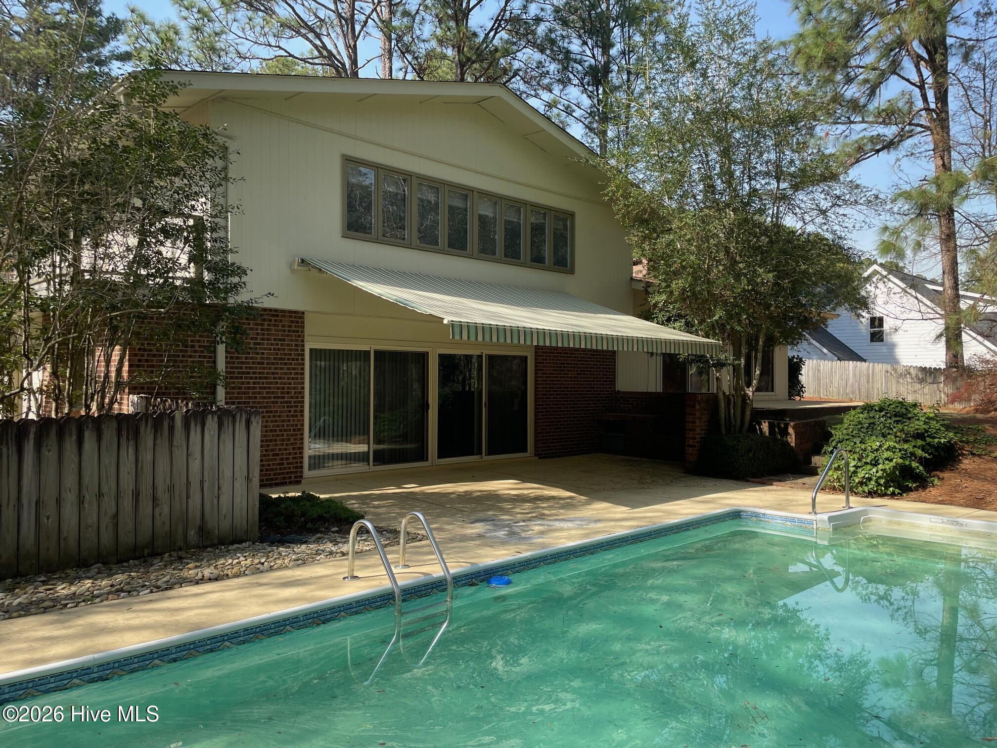 957 Sandavis Road Southern Pines, NC 28387 - Photo 39 of 61 957 SANDAVIS AWNING 2