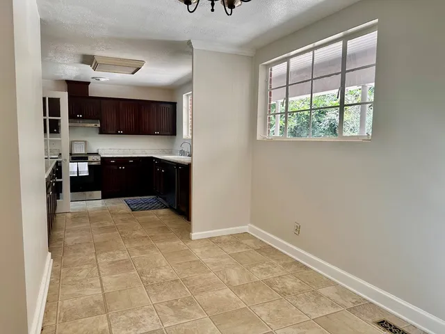 a view of a kitchen with a sink