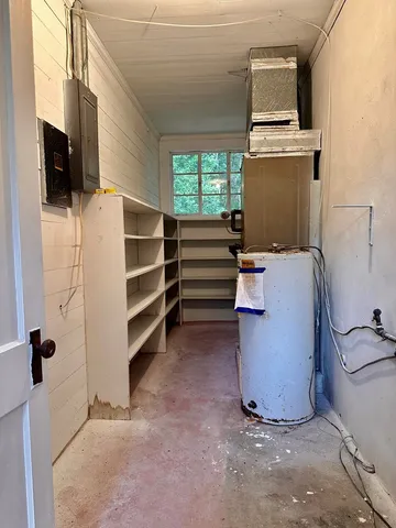 a room with storage and utility