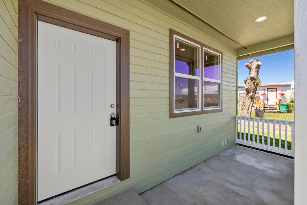 330 North Elm Street Merrill, OR 97633 - Photo 5 of 23 a house with entryway