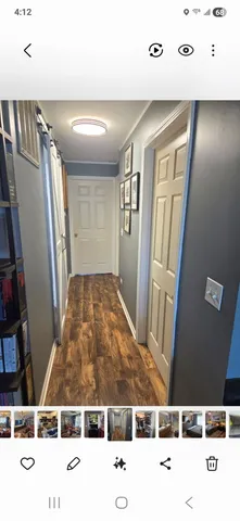 a bathroom with a sink a mirror and a shower