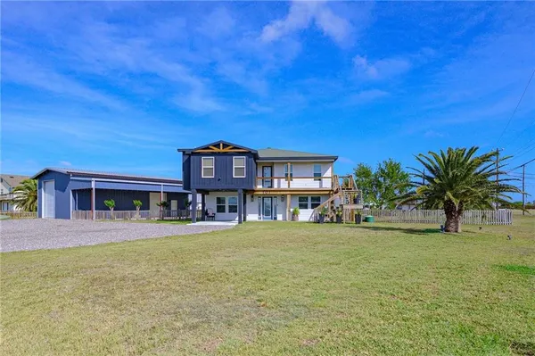 a house view with a garden space