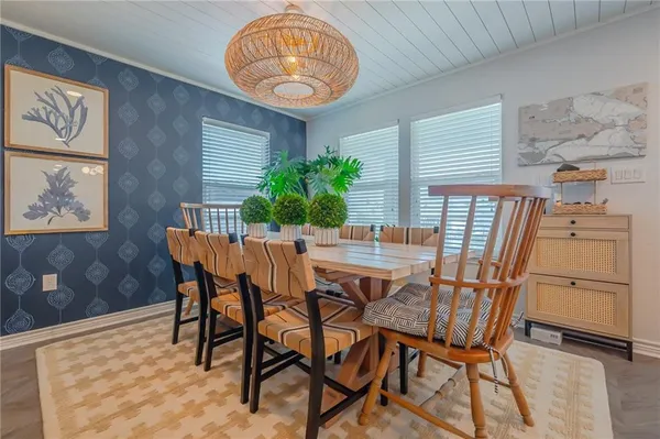 a view of a dining room with furniture
