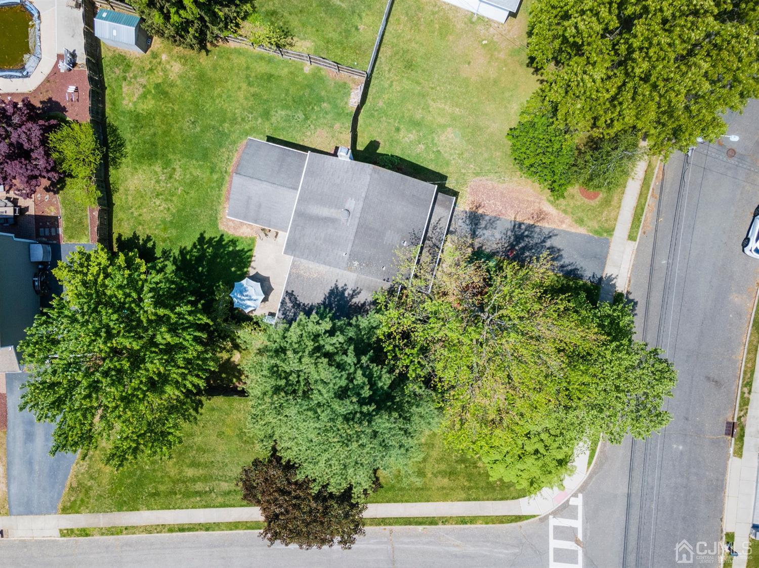 15 Tar Heels Road Hamilton, NJ 08619 - Photo 2 of 46 an aerial view of a house with a garden