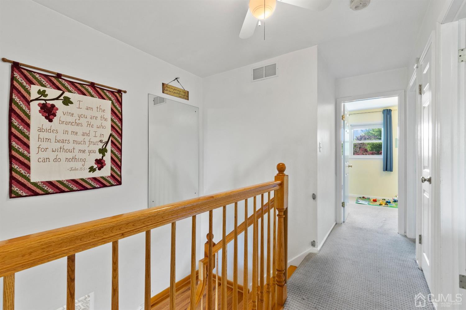 15 Tar Heels Road Hamilton, NJ 08619 - Photo 24 of 46 a view of a hallway with wooden floor and a bathroom