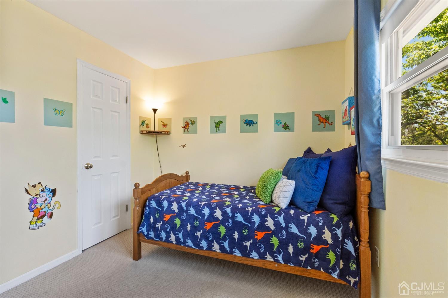 15 Tar Heels Road Hamilton, NJ 08619 - Photo 32 of 46 a bedroom with a bed and a window