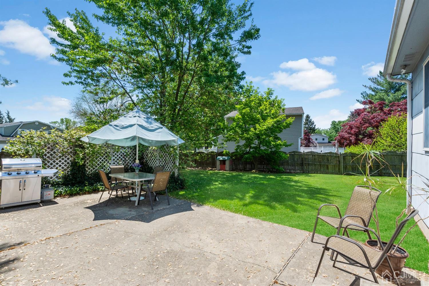 15 Tar Heels Road Hamilton, NJ 08619 - Photo 34 of 46 a view of a backyard with sitting area
