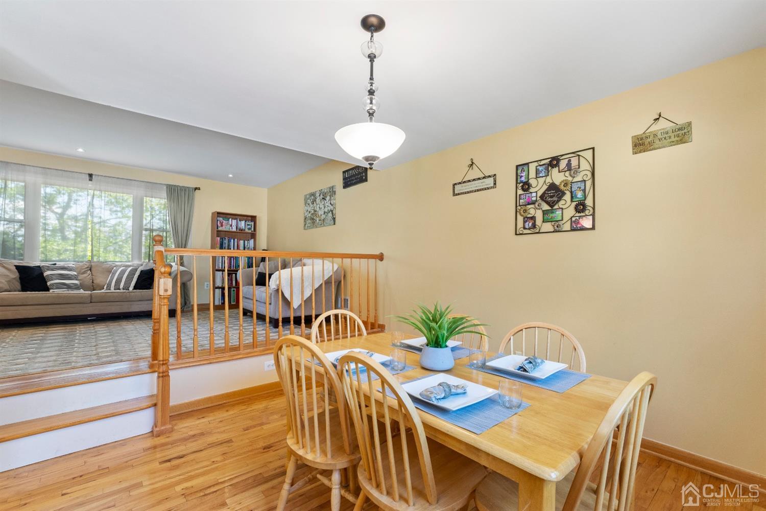 15 Tar Heels Road Hamilton, NJ 08619 - Photo 9 of 46 a view of a dining room with furniture and wooden floor