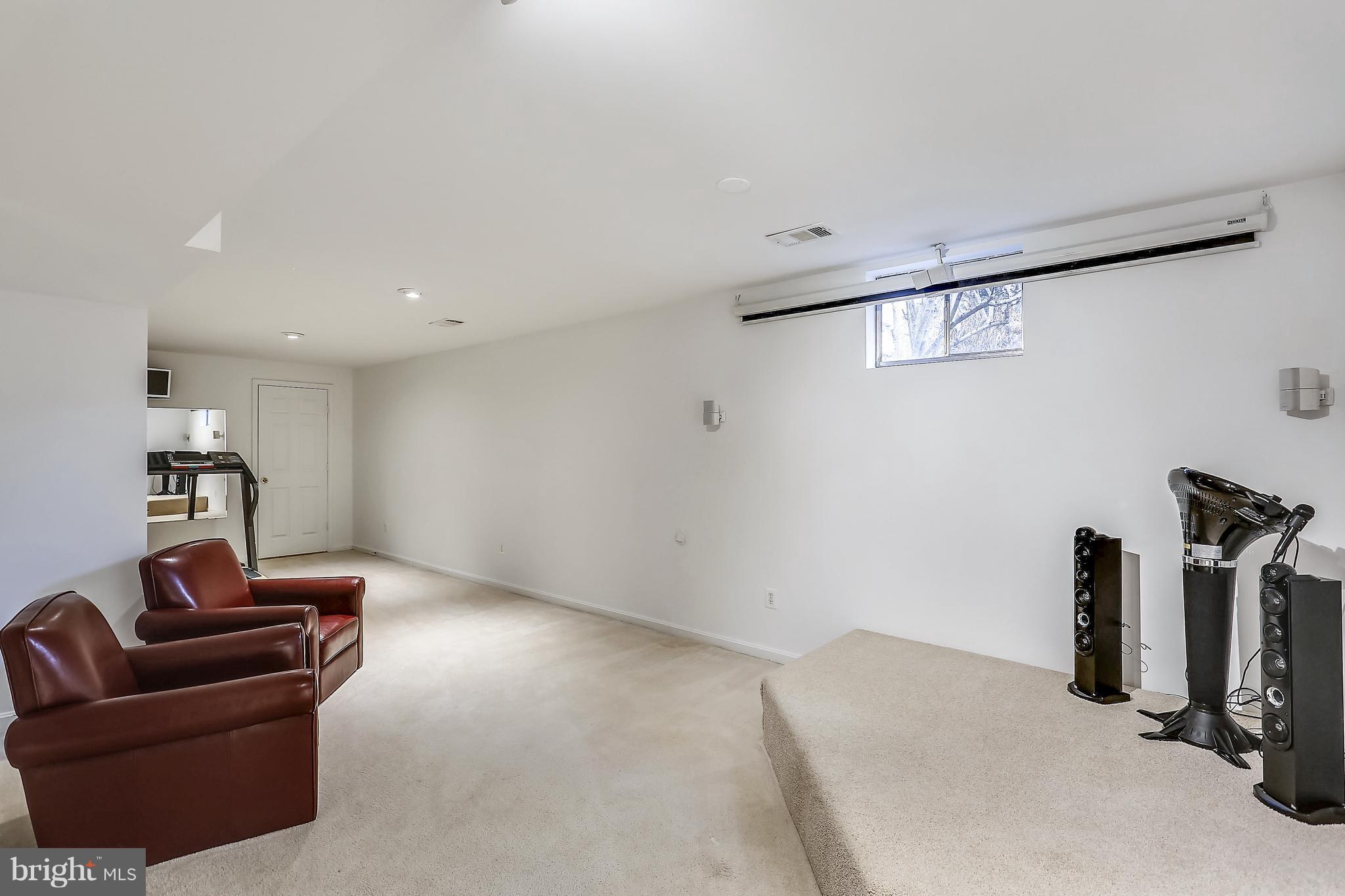 11402 Night Star Way Reston, VA 20194 - Photo 25 of 30 Lower Level Media Rm with projector and screen