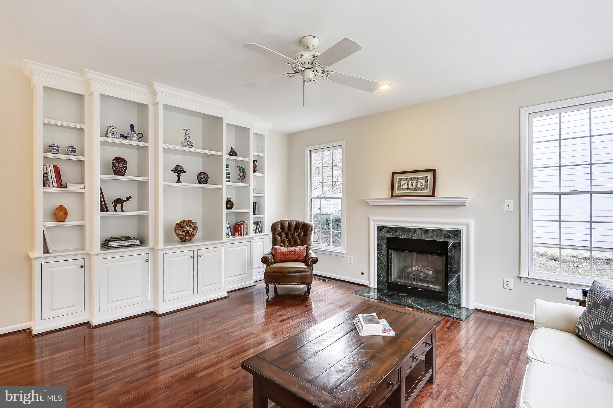 11402 Night Star Way Reston, VA 20194 - Photo 10 of 30 Family Room with built-in cabinetry