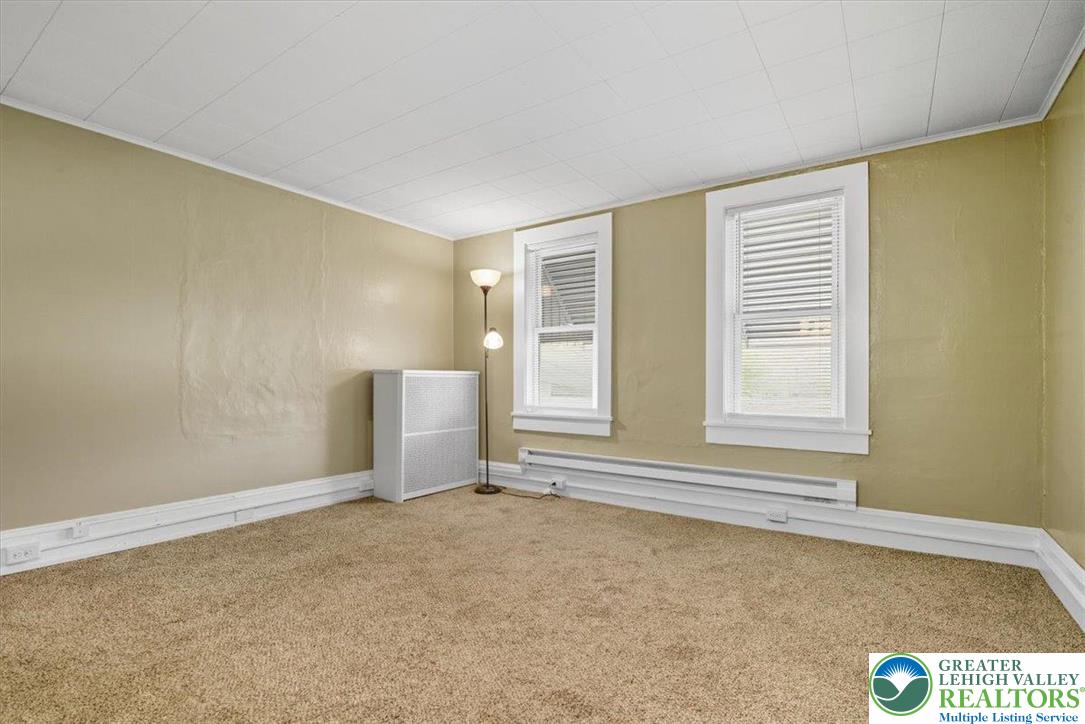 229 West High Street Nesquehoning, PA 18240 - Photo 15 of 38 an empty room with windows