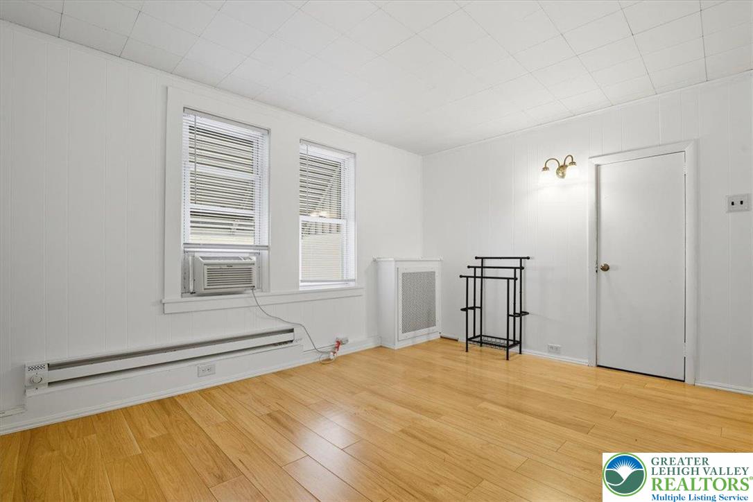 229 West High Street Nesquehoning, PA 18240 - Photo 21 of 38 a bedroom with a bed and a window