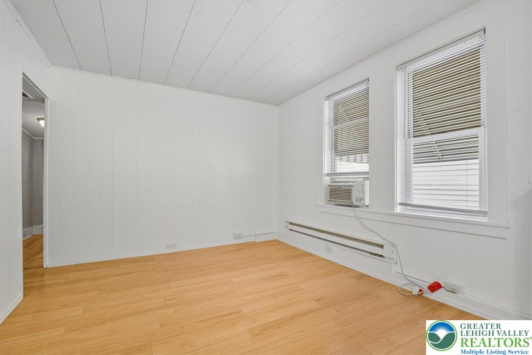 229 West High Street Nesquehoning, PA 18240 - Photo 22 of 38 a view of an empty room with a window