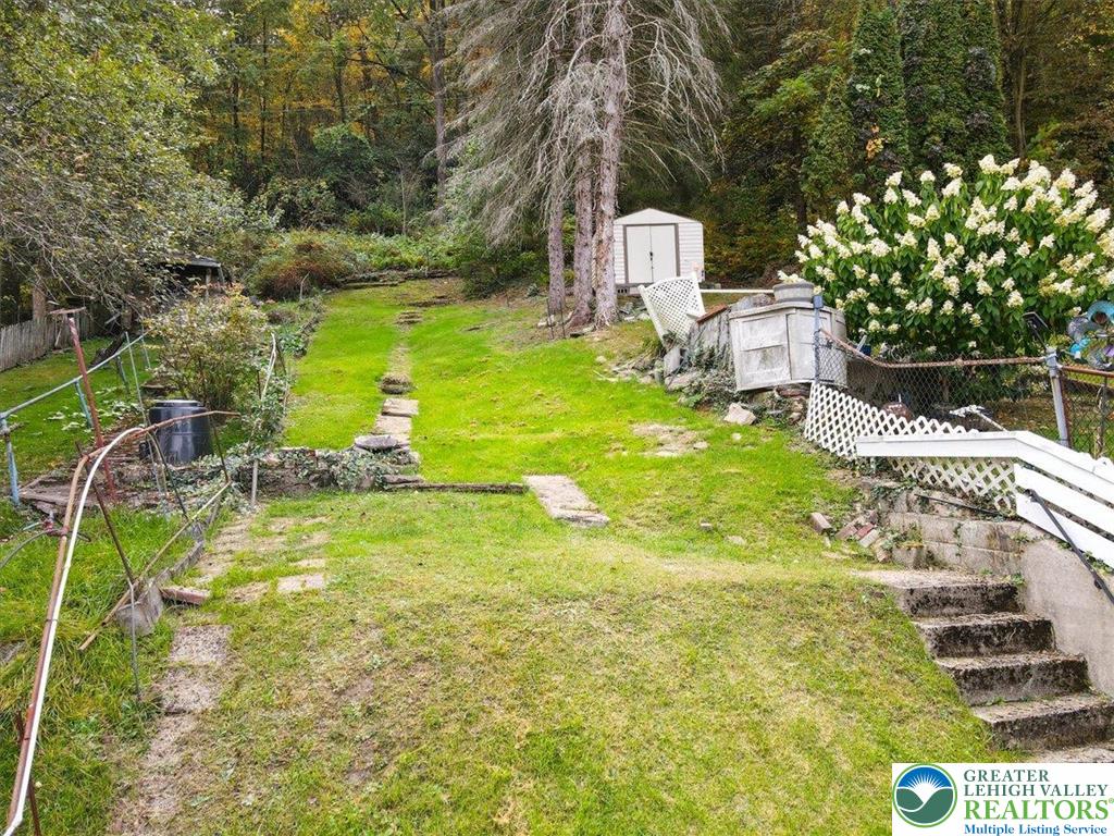 229 West High Street Nesquehoning, PA 18240 - Photo 35 of 38 a view of a house with a yard and sitting area