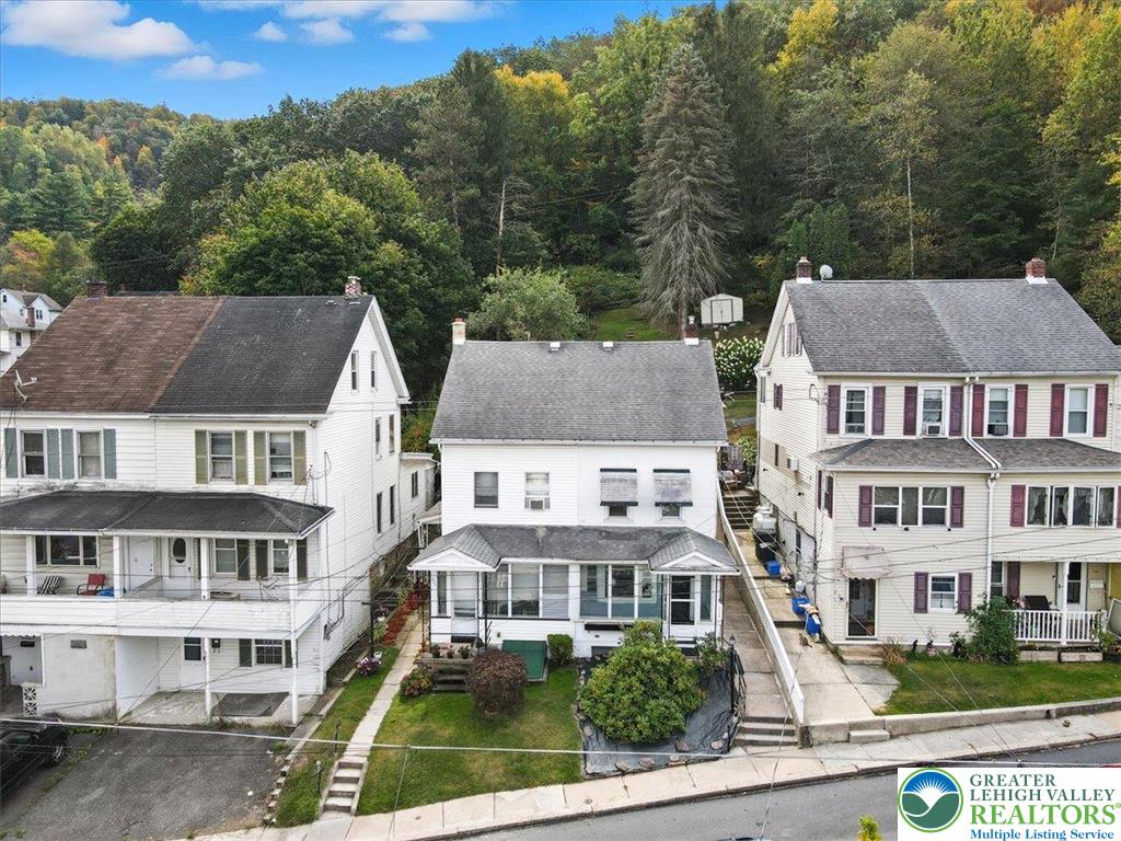 229 West High Street Nesquehoning, PA 18240 - Photo 36 of 38 a aerial view of a house next to a yard
