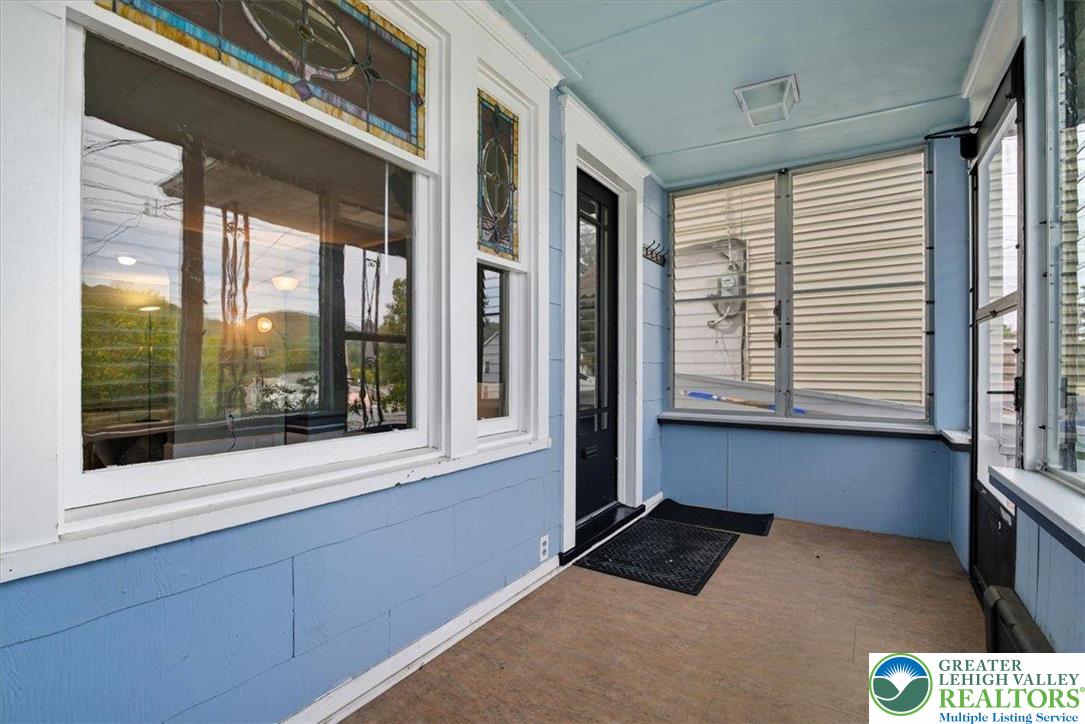 229 West High Street Nesquehoning, PA 18240 - Photo 4 of 38 a view of an empty room with a window
