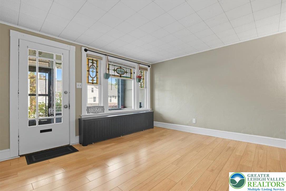 229 West High Street Nesquehoning, PA 18240 - Photo 8 of 38 a view of an empty room with a window