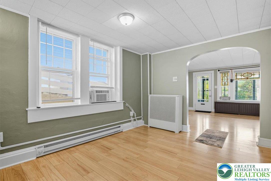 229 West High Street Nesquehoning, PA 18240 - Photo 9 of 38 a view of an empty room with a window