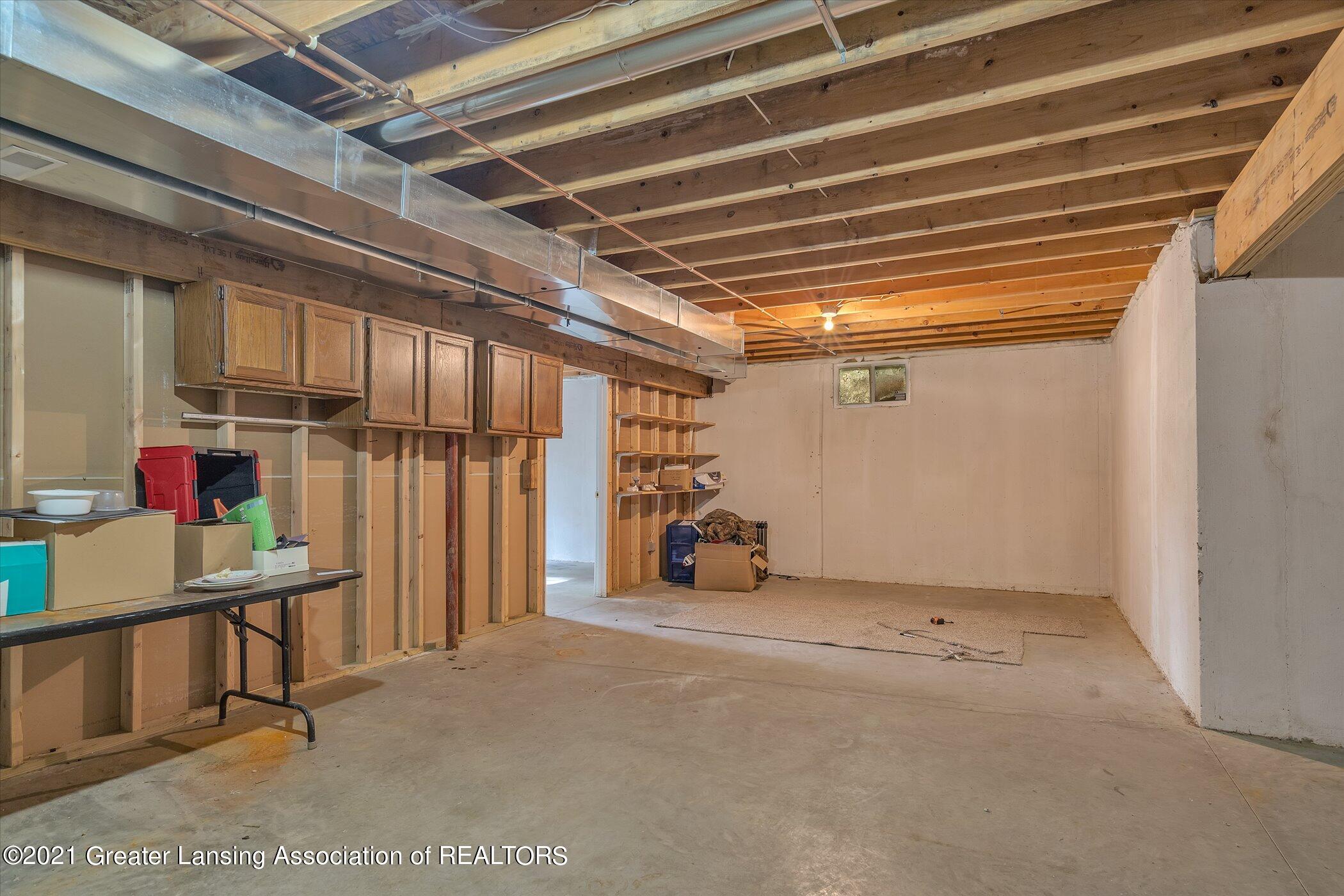 4603 Old Lansing Road Lansing, MI 48917 - Photo 25 of 34 25-4603-Old-Lansing-Rd-Windowstill-Real-