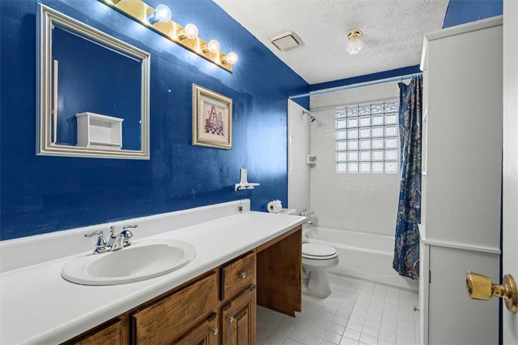 5 Ridgewood Drive Cartersville, GA 30120 - Photo 17 of 46 a bathroom with a sink and a mirror