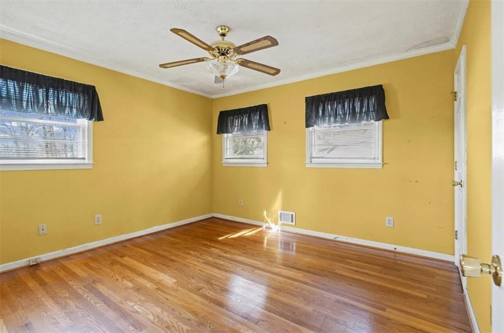 5 Ridgewood Drive Cartersville, GA 30120 - Photo 18 of 46 a view of a big room with wooden floor and windows