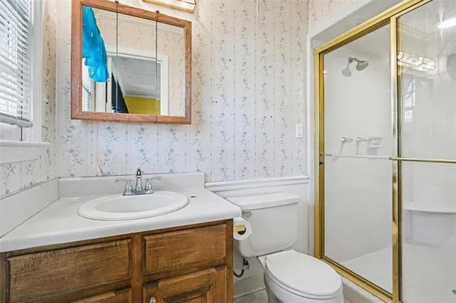 an empty room with a empty space and windows