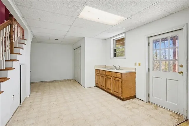 a view of a park with large trees