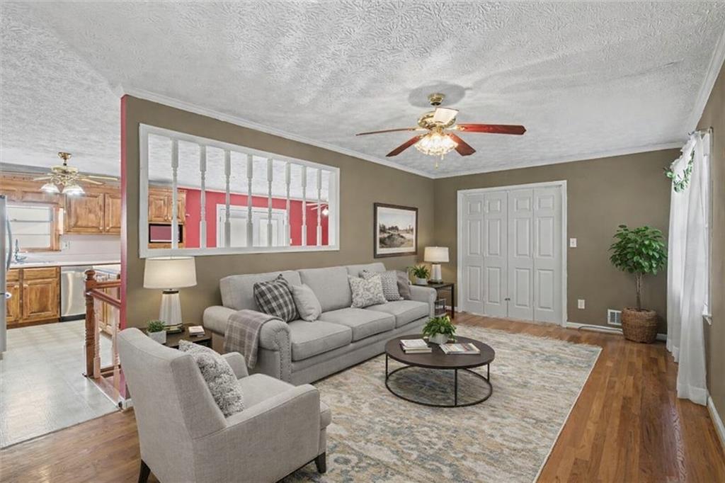 5 Ridgewood Drive Cartersville, GA 30120 - Photo 3 of 46 a living room with furniture and a large window