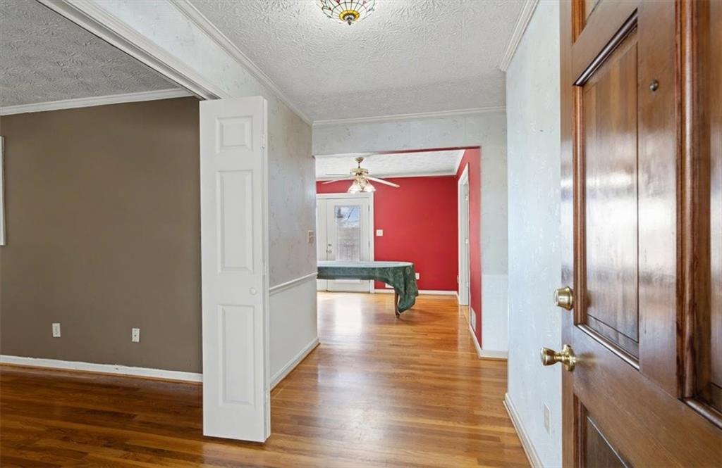5 Ridgewood Drive Cartersville, GA 30120 - Photo 6 of 46 a view of a hallway with couches and dinning table