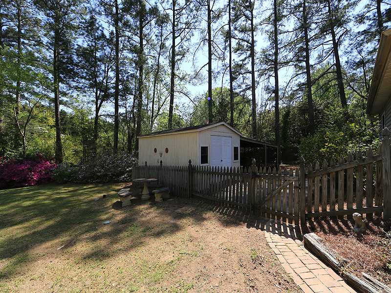 1504 Stratlen Court Raleigh, NC 27615 - Photo 15 of 17 Great Storage Shed with Additional Covered Parking Yard