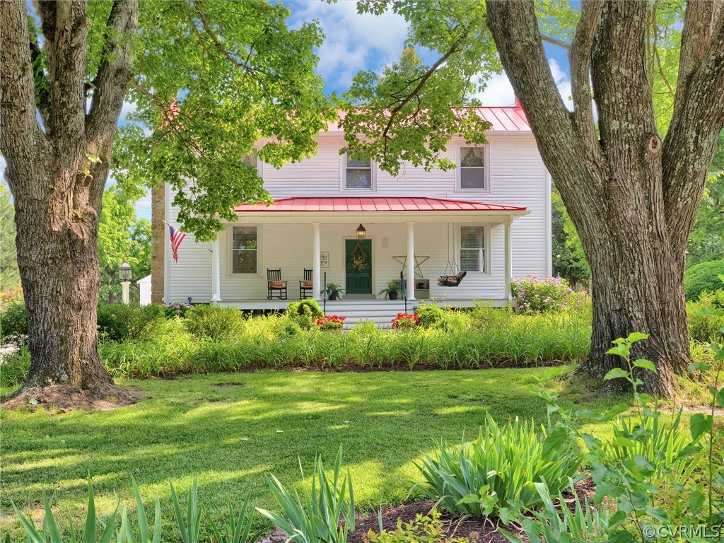 193 Robertsons Siding Road Crewe, VA 23930 - Photo 2 of 47 a view of a house with garden and a tree