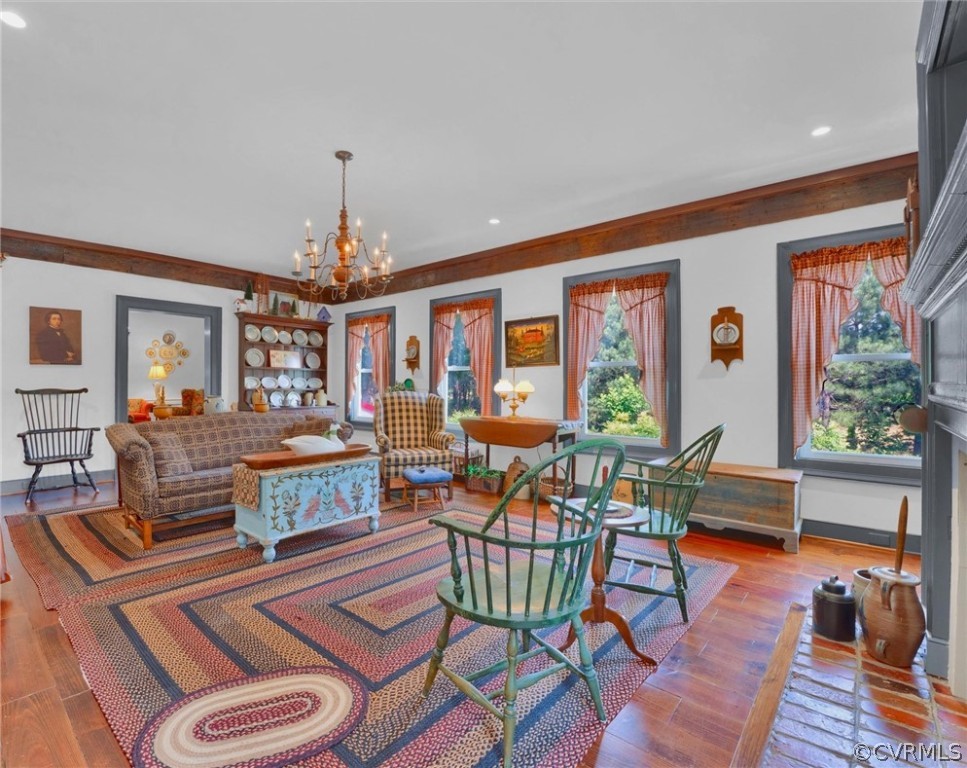 193 Robertsons Siding Road Crewe, VA 23930 - Photo 22 of 47 a living room with furniture a window and a chandelier