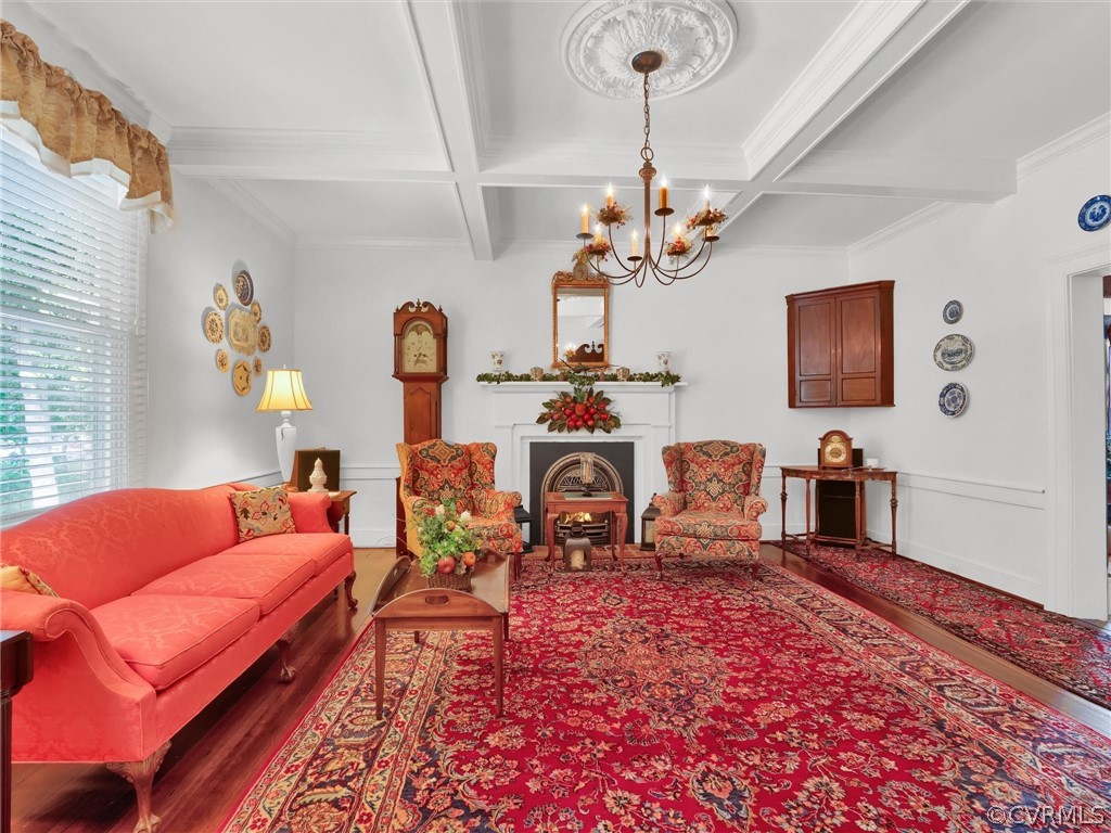 193 Robertsons Siding Road Crewe, VA 23930 - Photo 6 of 47 a living room with furniture a chandelier and a rug