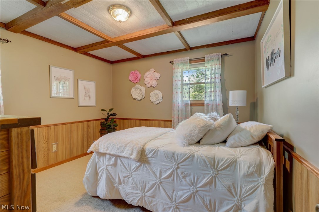 3385 West Western Reserve Road Canfield, OH 44406 - Photo 12 of 29 Carpeted bedroom featuring beam ceiling and coffered ceiling