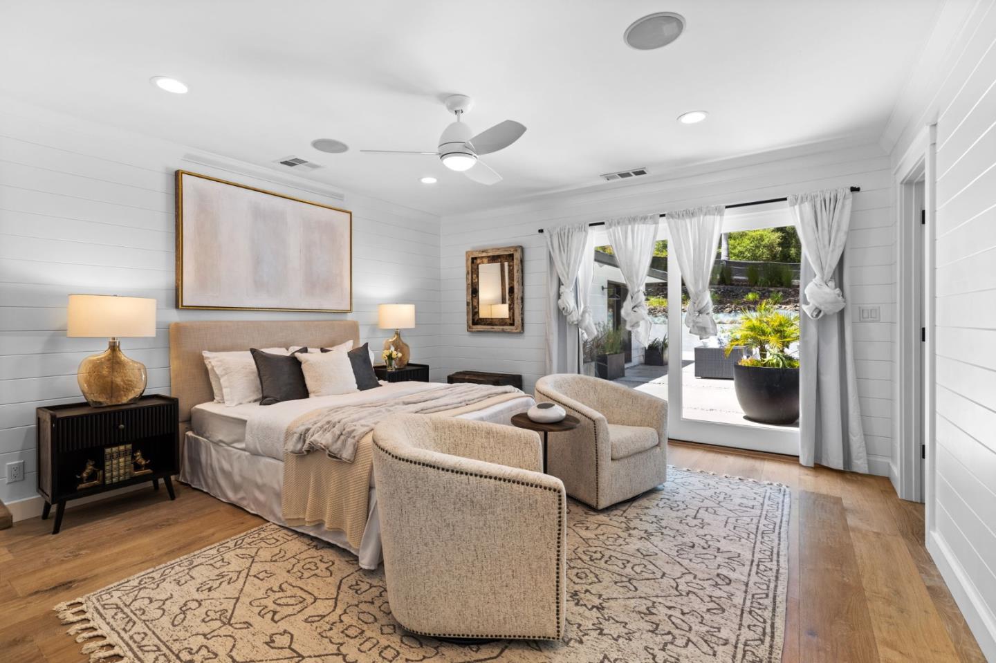 595 Summit Spring Road Woodside, CA 94062 - Photo 35 of 56 a bed room with a bed and a couch